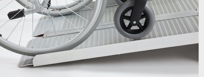 Wheelchair Ramp Buying Guide wheelchair going up ramp 