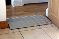 Aluminium threshold ramp in place