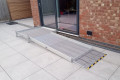 Aluminium modular wheelchair ramp outside double doorway