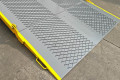 Mesh surface on the yard ramp and side handles