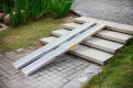 Telescopic channel ramps on stairs