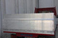 Hinged tailboard attached to van