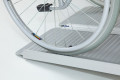 Wheelchair going up wheelchair ramp 