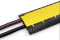 2 cables passing through the Adam Hall Defender Mini 3 channel cable protector