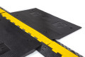 Wheelchair ramp cable protector grip surface
