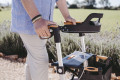 Rollator with backrest and seat