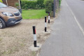 Removable parking bollards installed on driveway