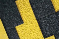 Black or yellow anti-slip steel nosing with grit surface