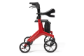 Side view of the four wheeled rollator with bag, seat and backrest in red 