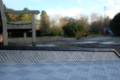 Raised edge on adjustable threshold ramp 