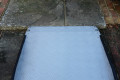 Adjustable threshold ramp next to step 