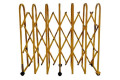 Yellow expandable gate barrier on wheels