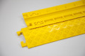 Base of yellow cable cover 