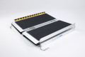 Compact stored wheelchair ramp 