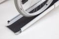 Curved end of telescopic wheelchair ramps 
