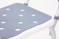 Self-draining shower stool seat