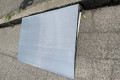 Aluminium wedge ramp by kerb 