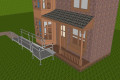 modular ramp with handrails out the front of a property
