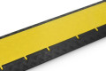 Anti-slip surface on the floor cable protector