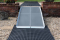 Multi-fold ramp resting on step
