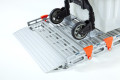 Trolley going up rollable ramp 