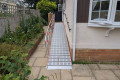 RollAble wheelchair ramp with handrail
