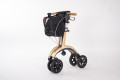 Gold rollator folded