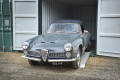 Vintage car on loading ramps
