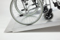 Wheelchair on wheelchair ramp