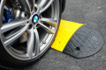 Heavy duty speed bump secured to tarmac 