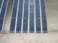Rubber coated channel ramps 