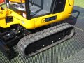 Mini digger on Trackguard mat 