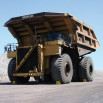 Wheel chocks under heavy duty vehicle