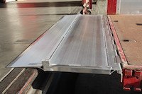 Heavy duty hinged tailboard in place 