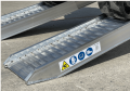pair of loading ramps resting on ground 