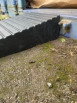 Rubber container ramp against a container 