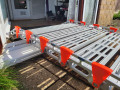 side view of rollable ramp going into pvc door