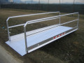 Vehicle gangway resting over trench