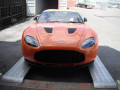 Sports car going up car loading ramps
