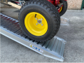 plant machinery going up alloy ramps 
