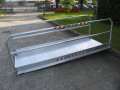 Pedestrian ramp with handrails 
