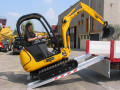 digger driving up ramps