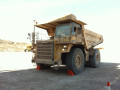 Red Checkers wheel chocks in use