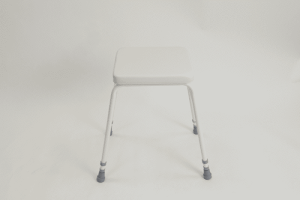 White adjustable perching stool 