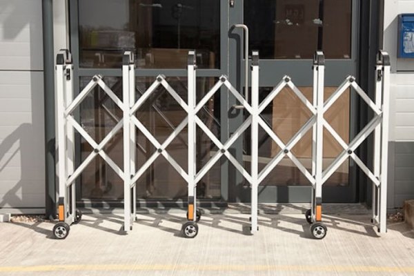 Expandable barrier outside warehouse 