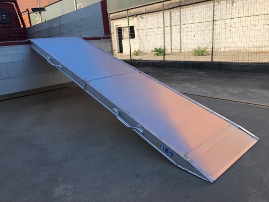 Viper heavy duty folding van ramp resting on tipper truck 