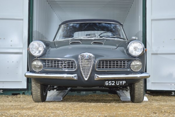 Classic car on loading ramps 