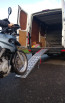 Motorbike going up ramp