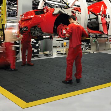 Anti-fatigue mat installed in car factory