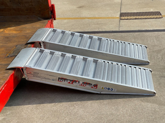 Pair of container ramps resting on container